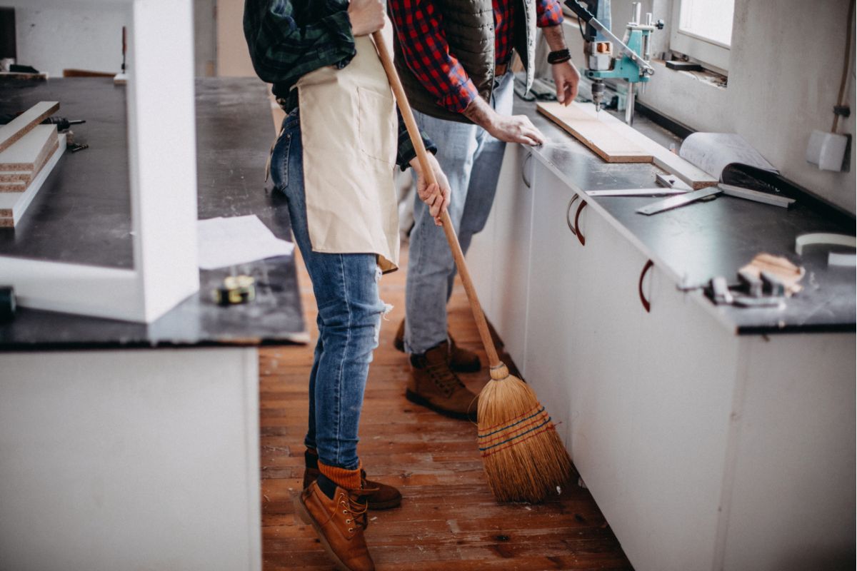 Woman Dusting in Hard-to-Reach Areas