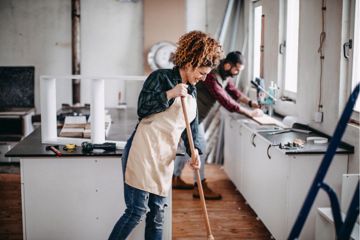 woman and man post-construction cleaning